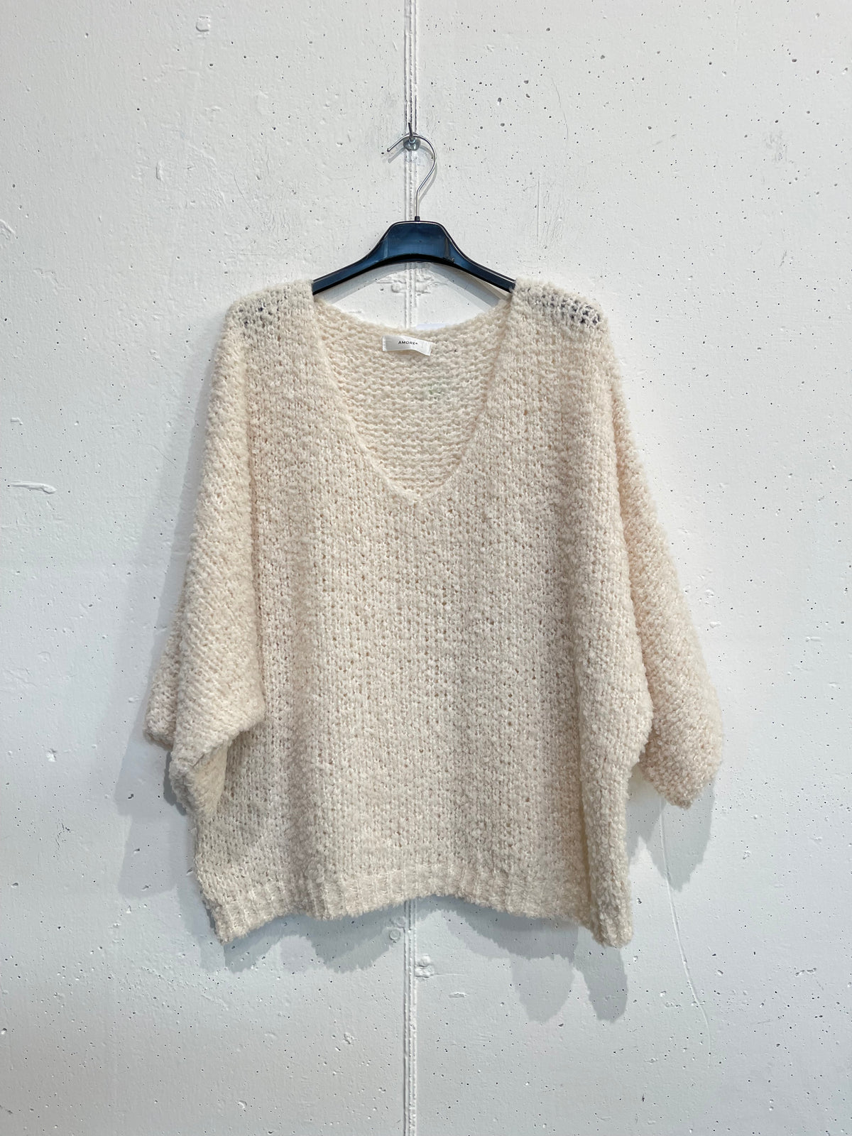 Pull Bouclè con manica a tre quarti