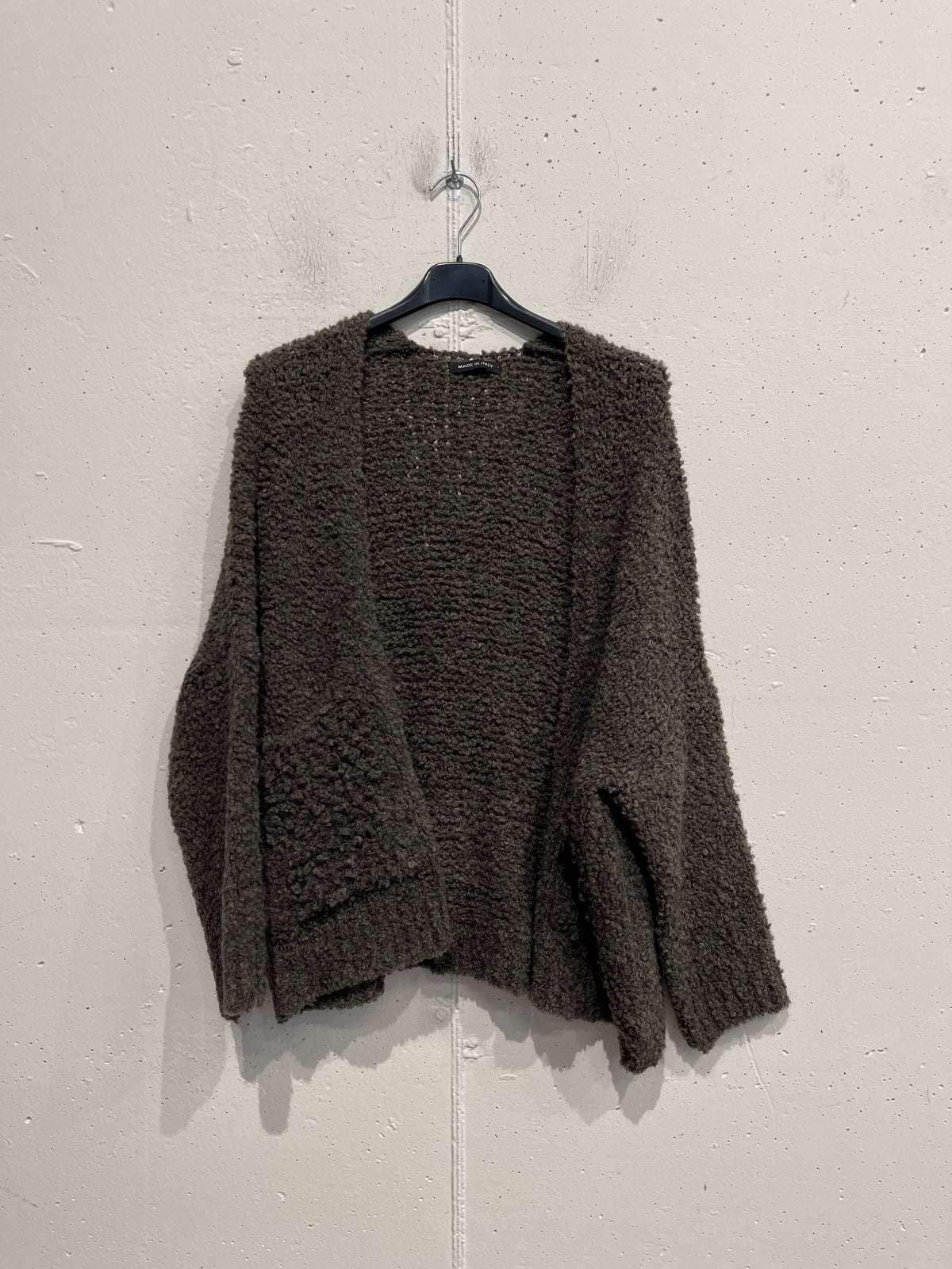 Cardigan bouclè con tasche