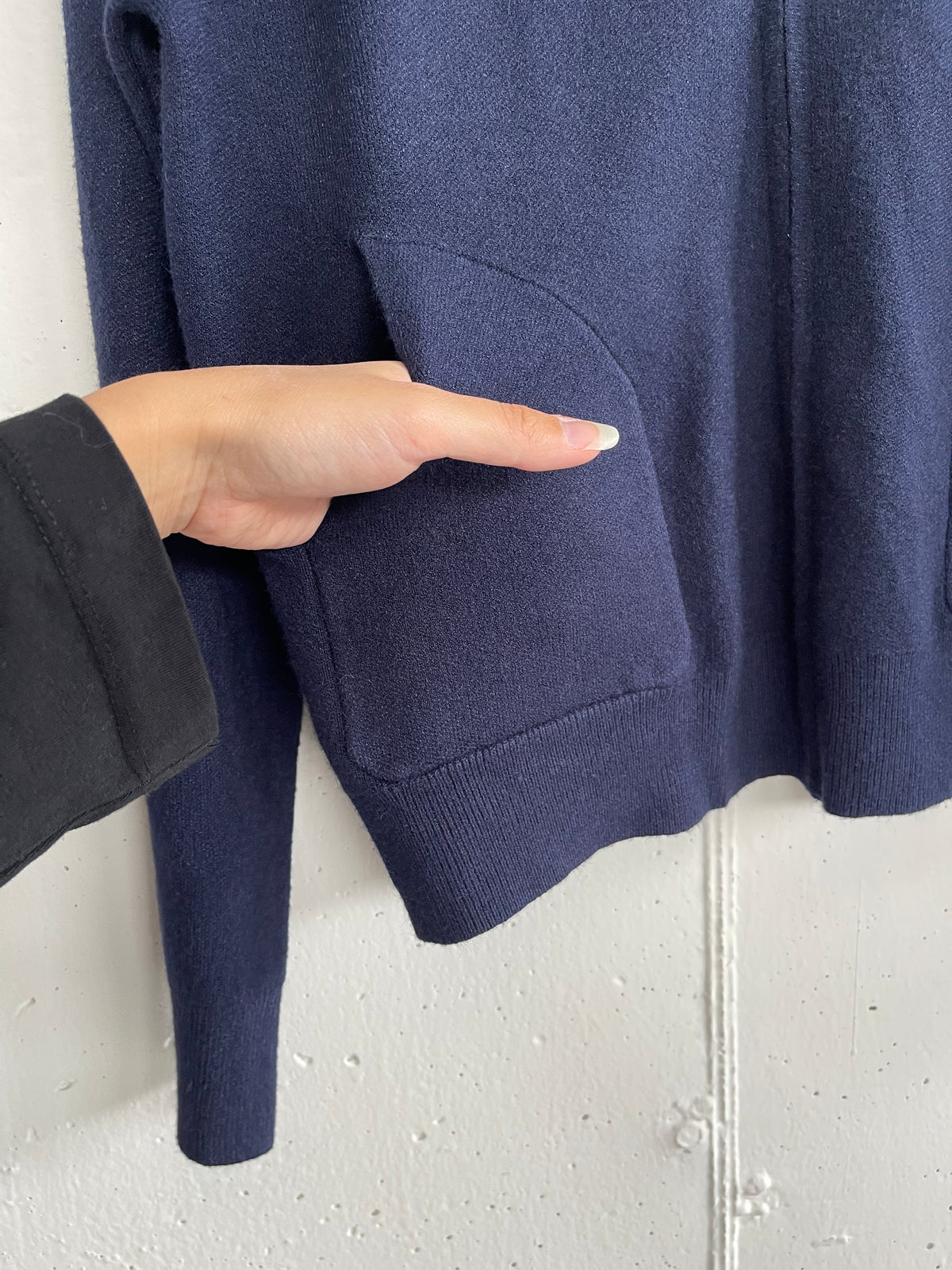 Felpa in maglia con zip e tasche