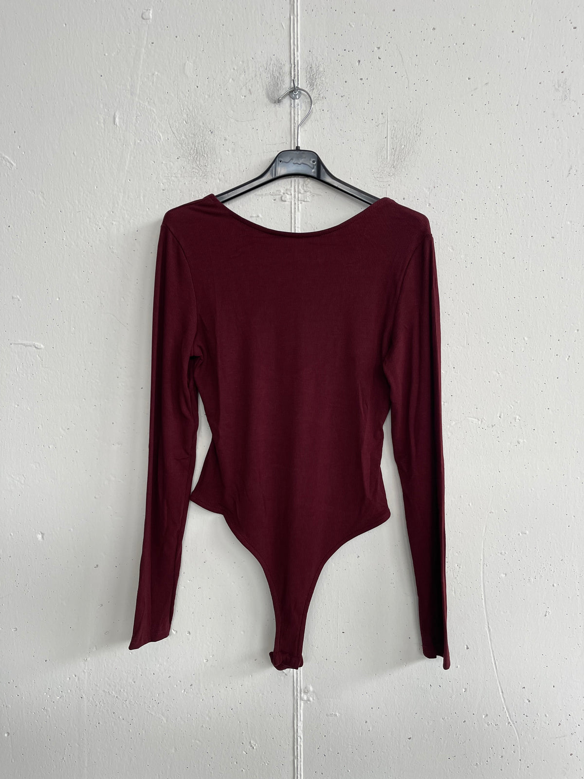 Body a manica lunga con schiena scoperta