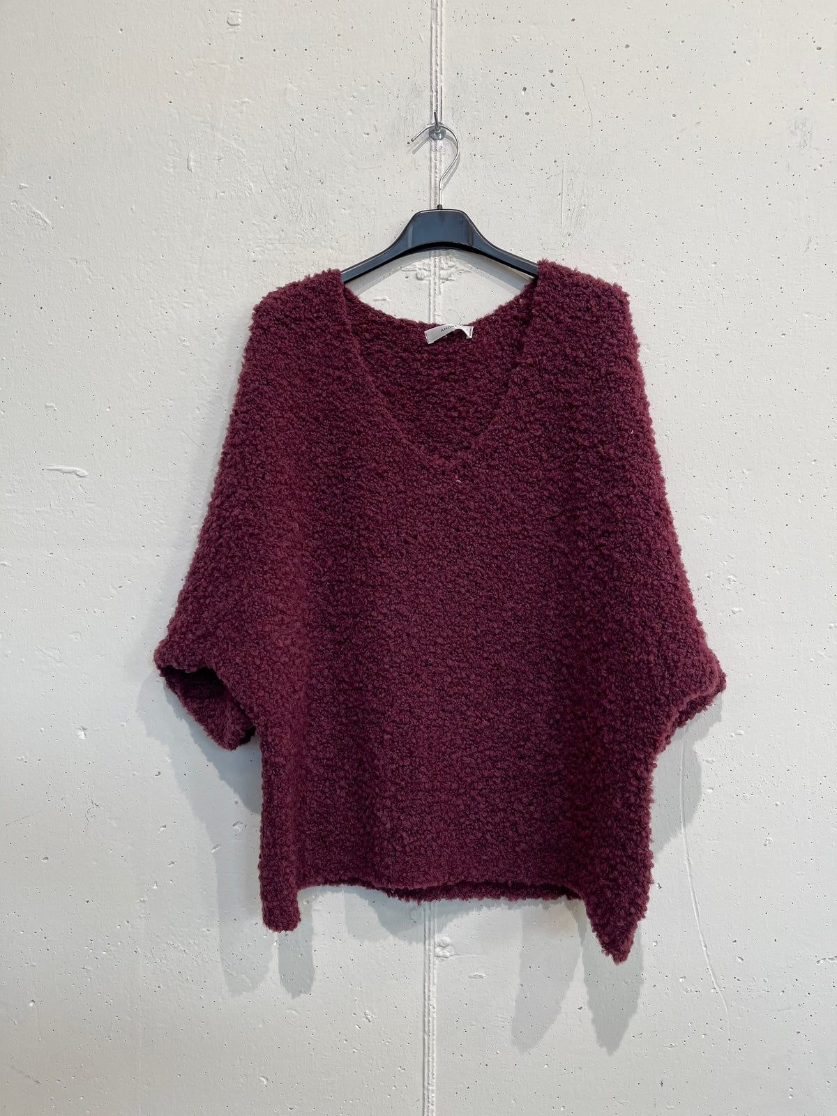 Pull Bouclè con manica a tre quarti