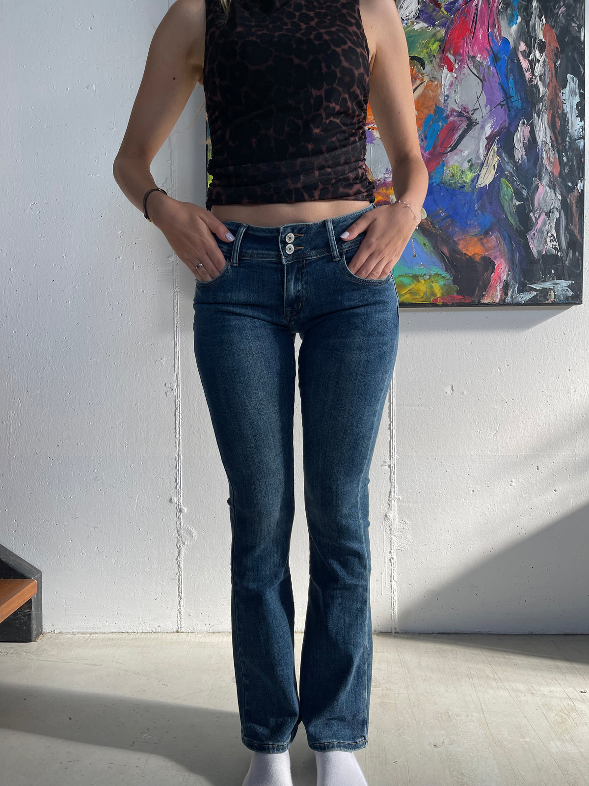 Jeans a zampa a vita bassa