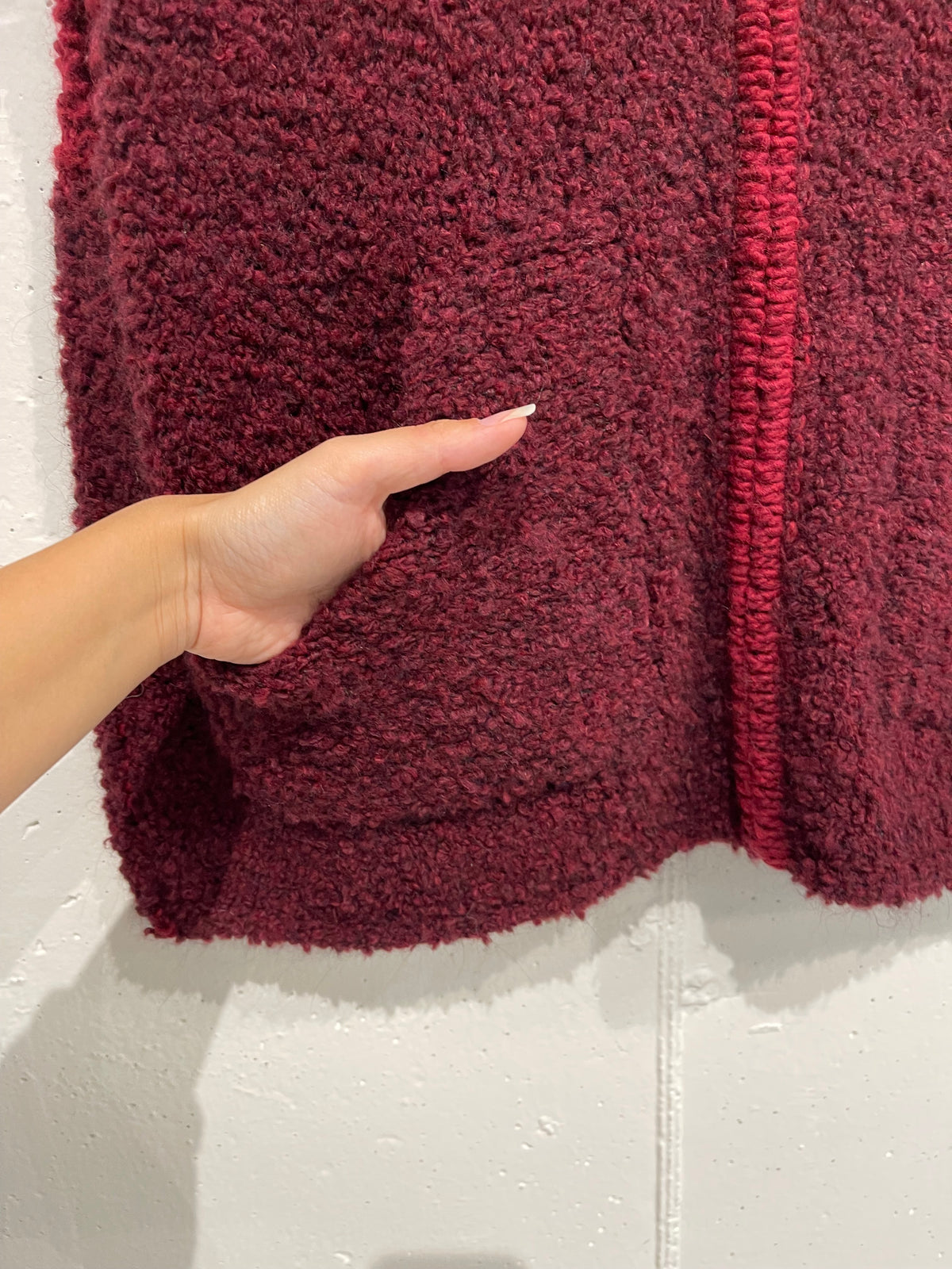 Gilet con zip e cappuccio in bouclè