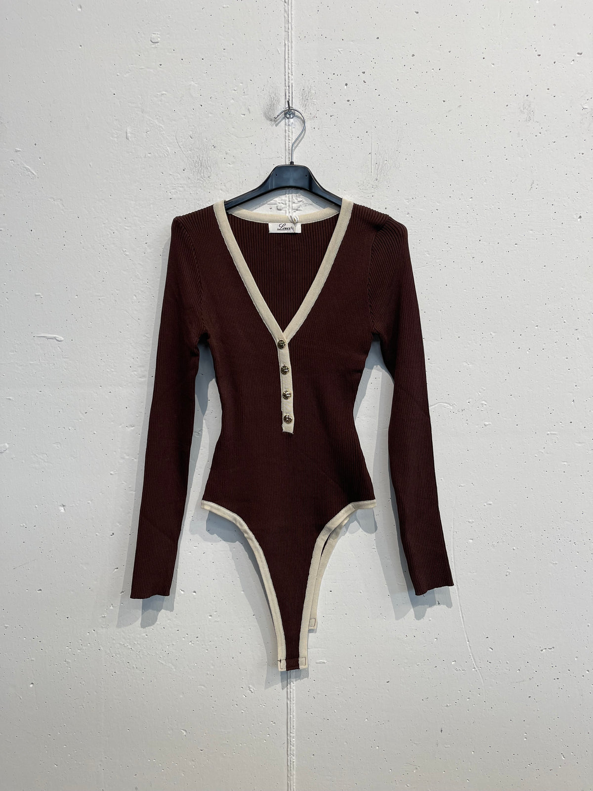 Body con bottoncini dorati