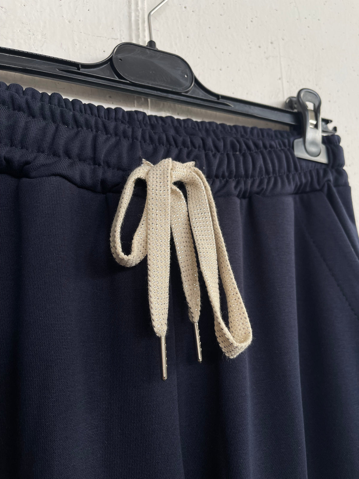 Pantaloni tuta con laccio glitter