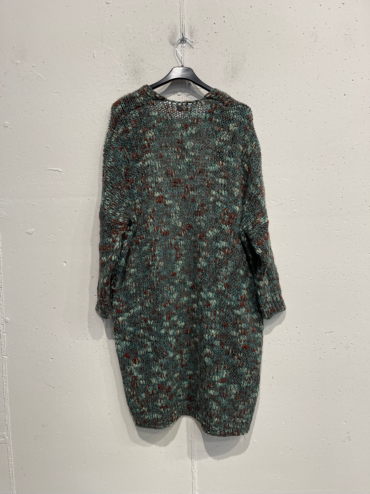 Cardigan bouclè con tasche lungo