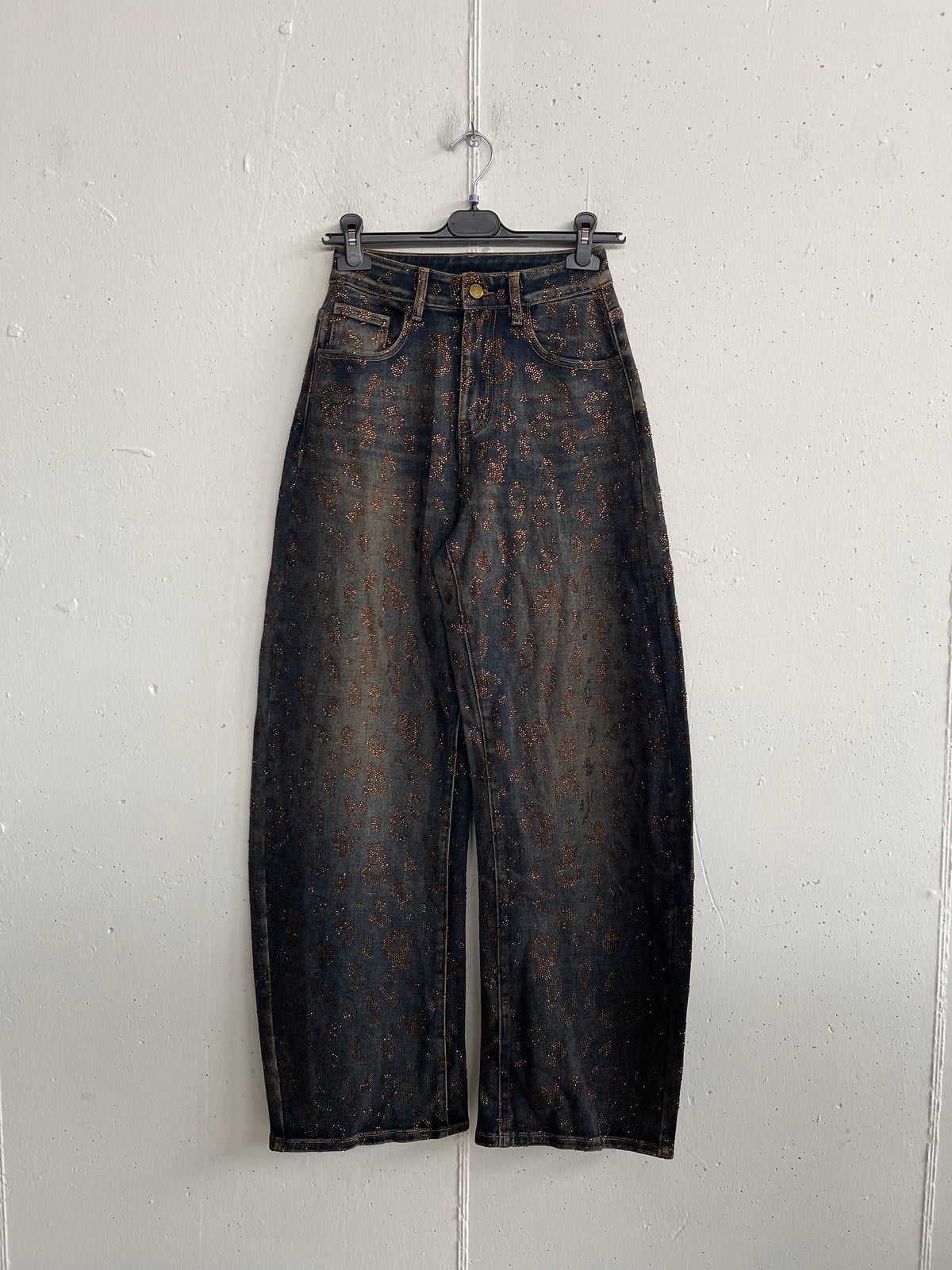 Jeans maculato con glitter