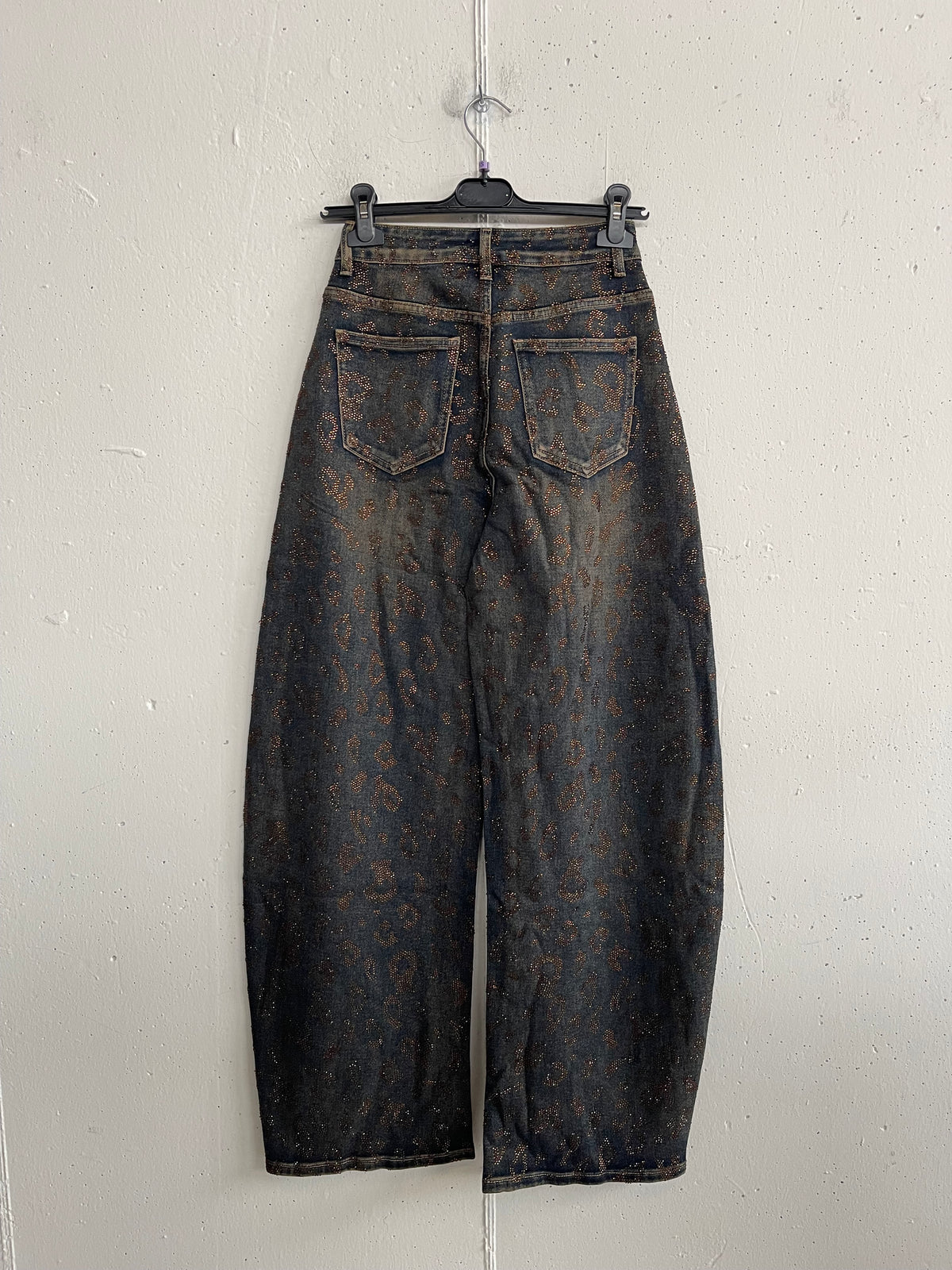 Jeans maculato con glitter