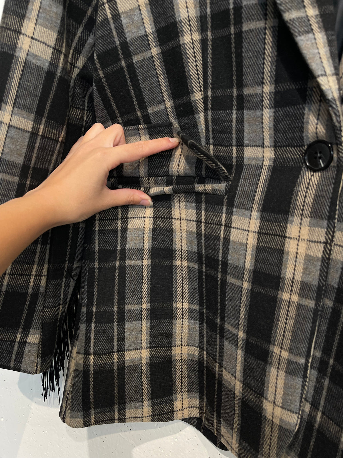 Blazer con frange solo sul retro