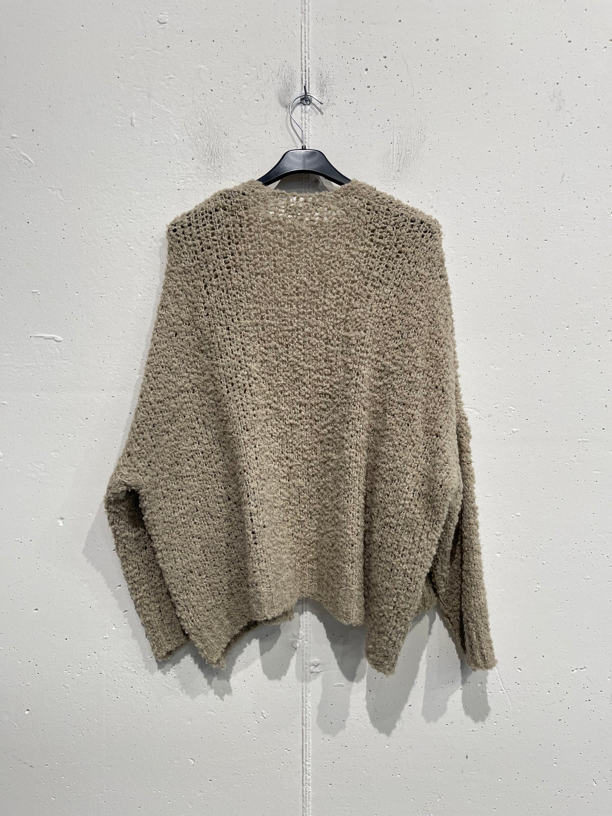 Cardigan bouclè con tasche
