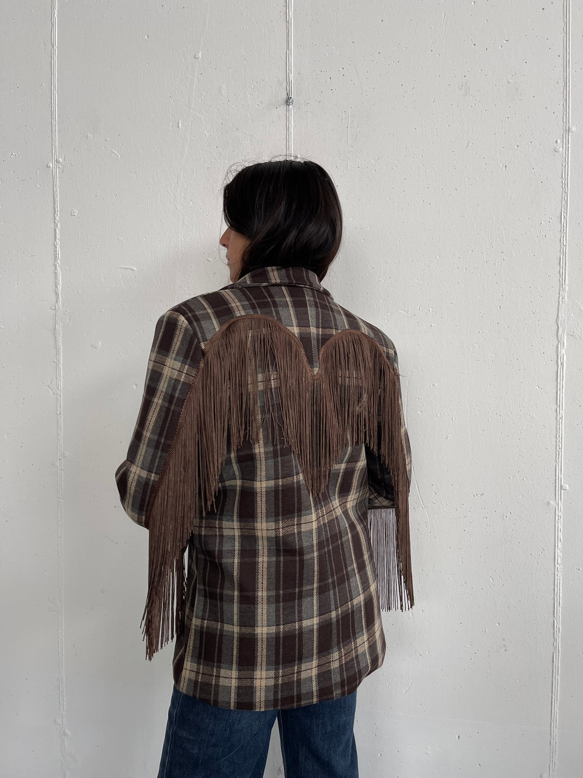 Blazer con frange solo sul retro