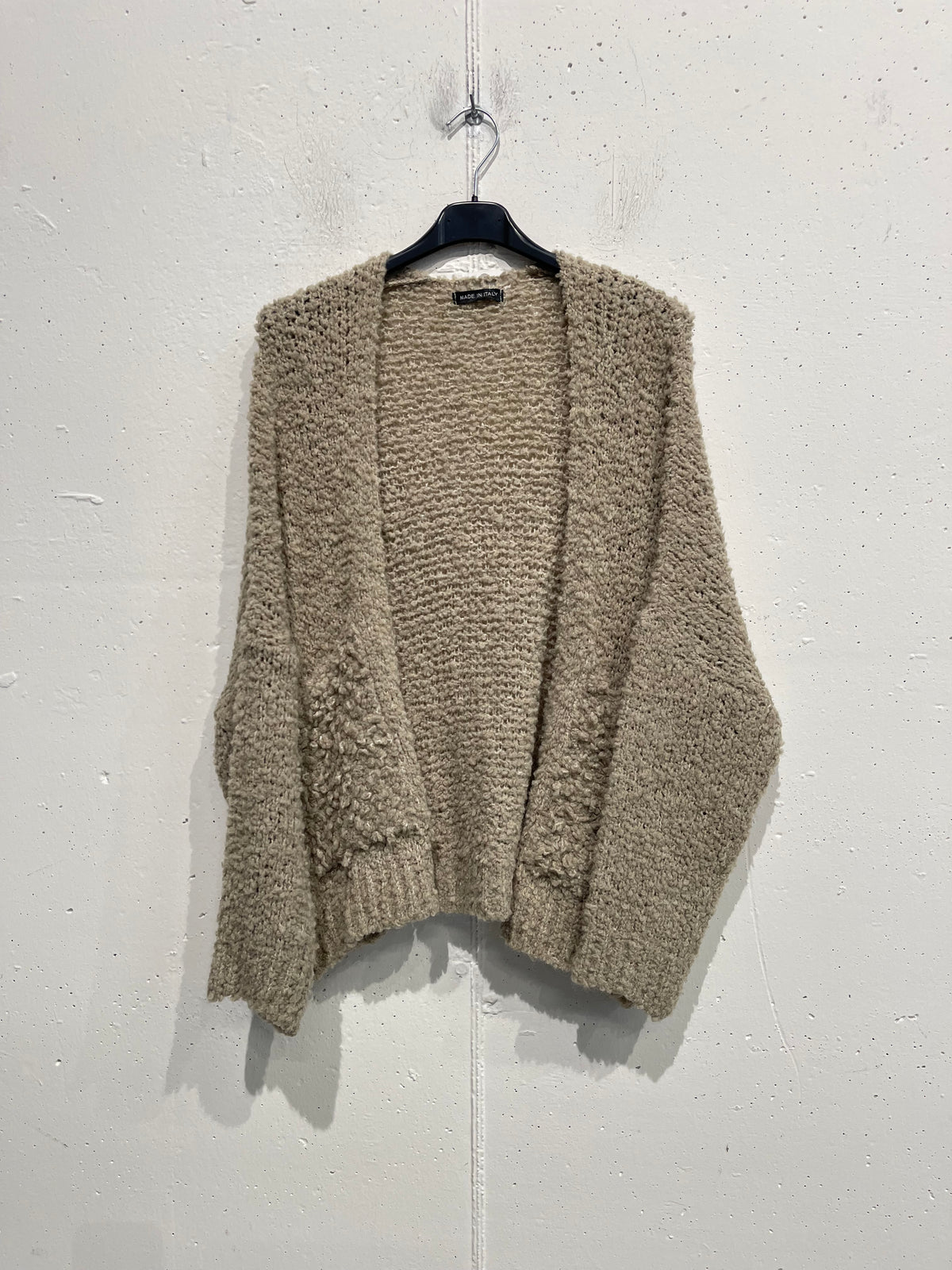 Cardigan bouclè con tasche