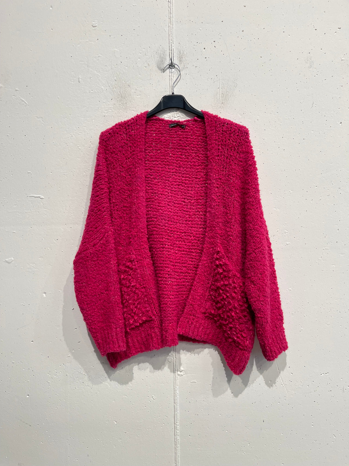 Cardigan bouclè con tasche
