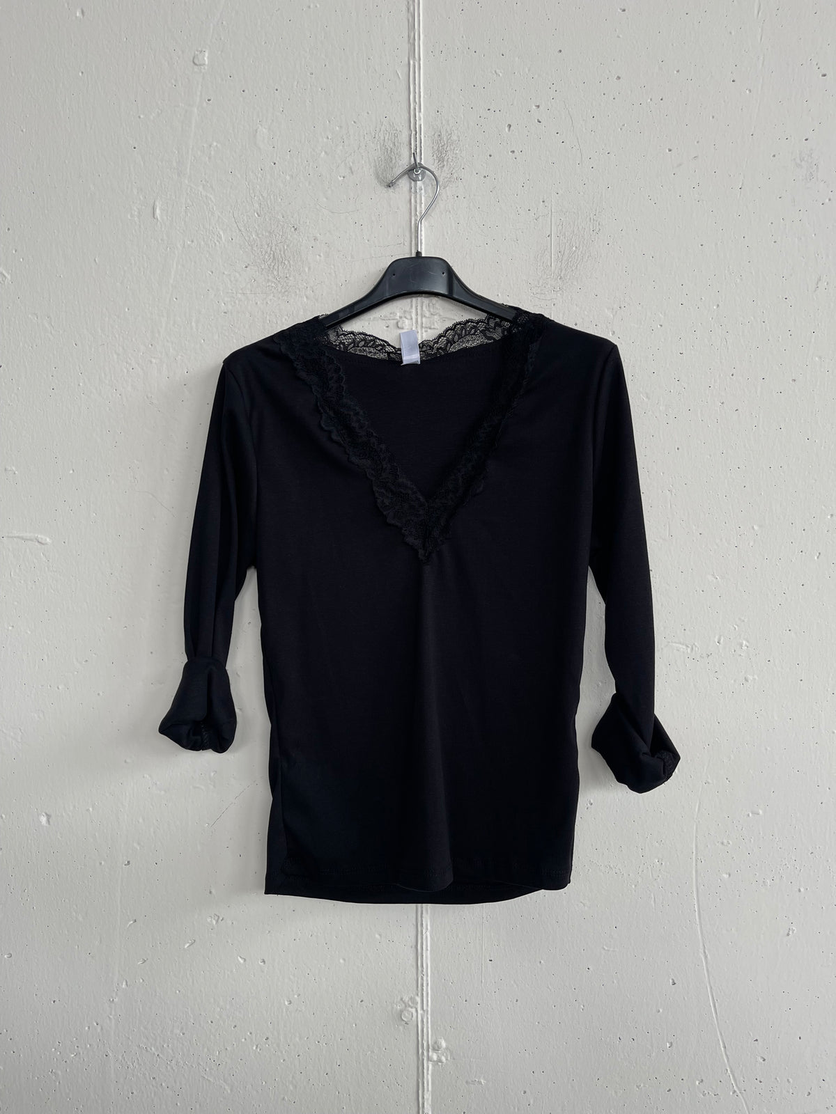 Maglia a manica lunga con scollo in pizzo