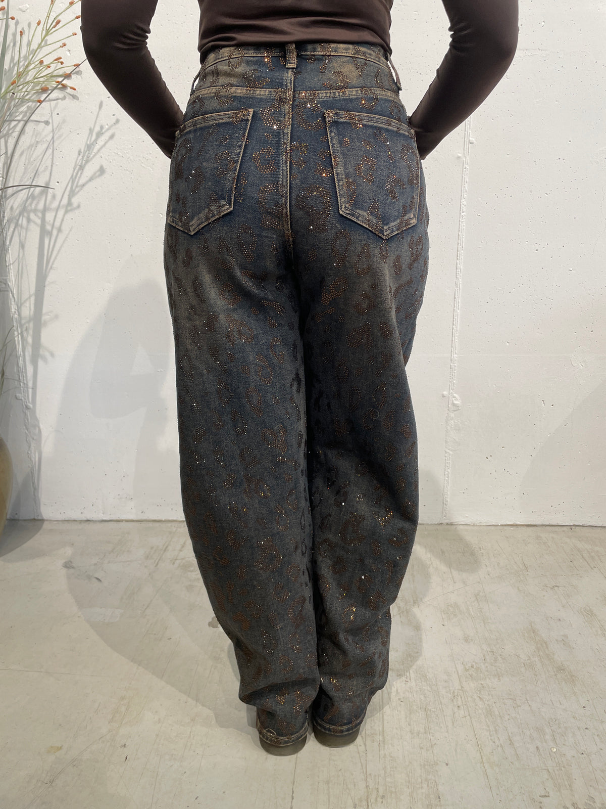 Jeans maculato con glitter