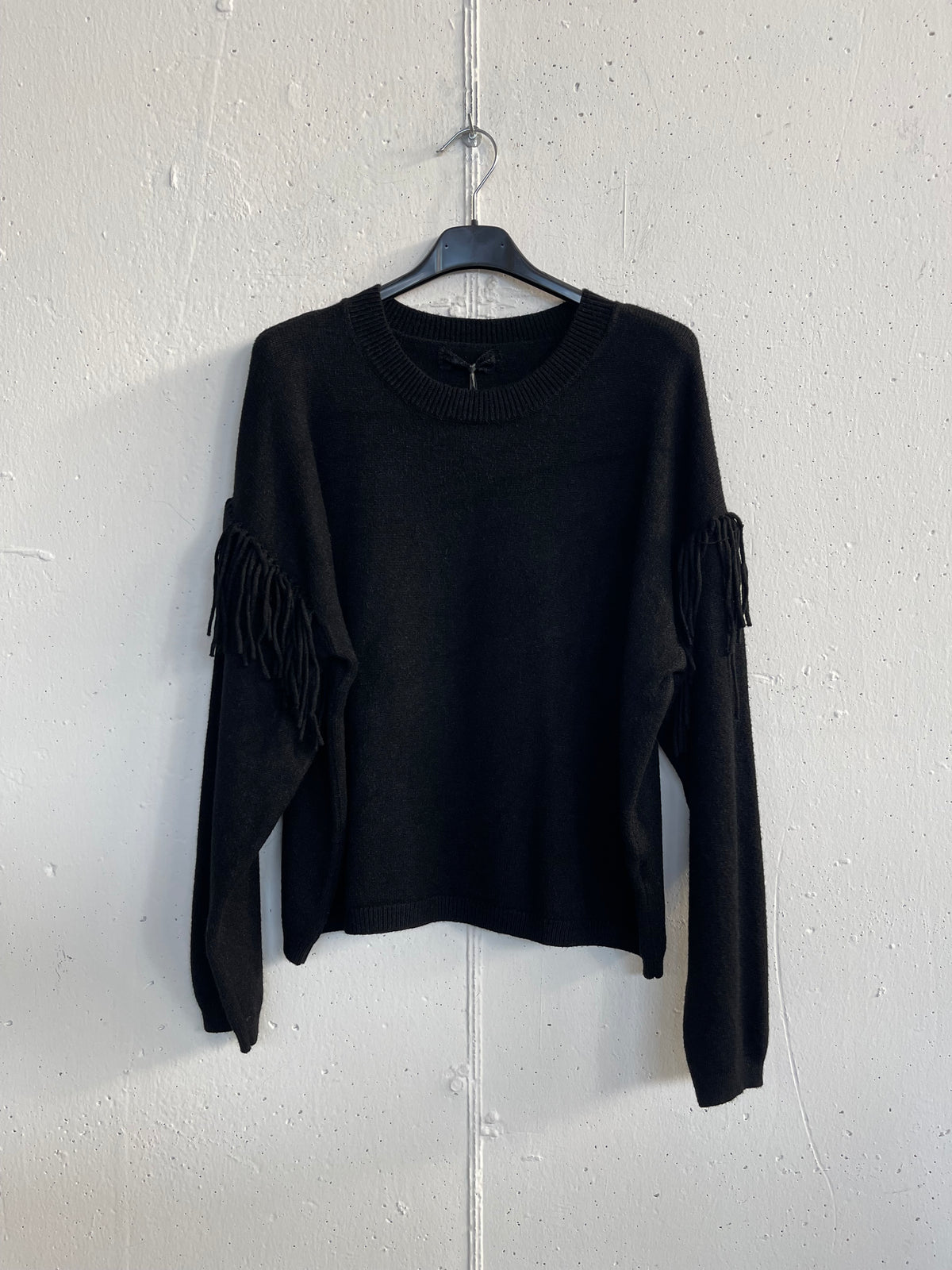 Pull con frange