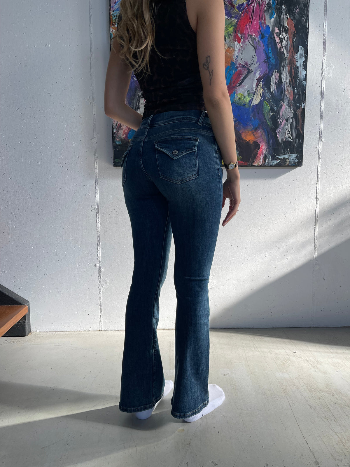 Jeans a zampa a vita bassa