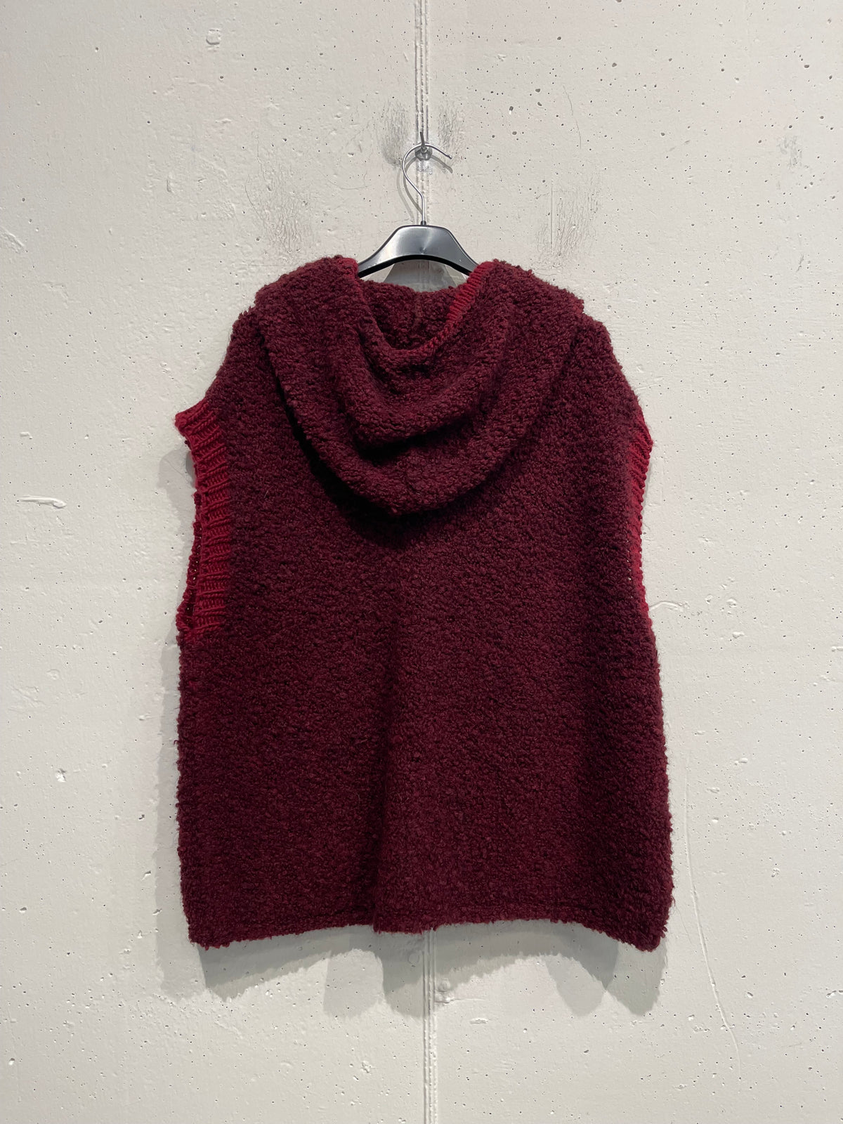 Gilet con zip e cappuccio in bouclè