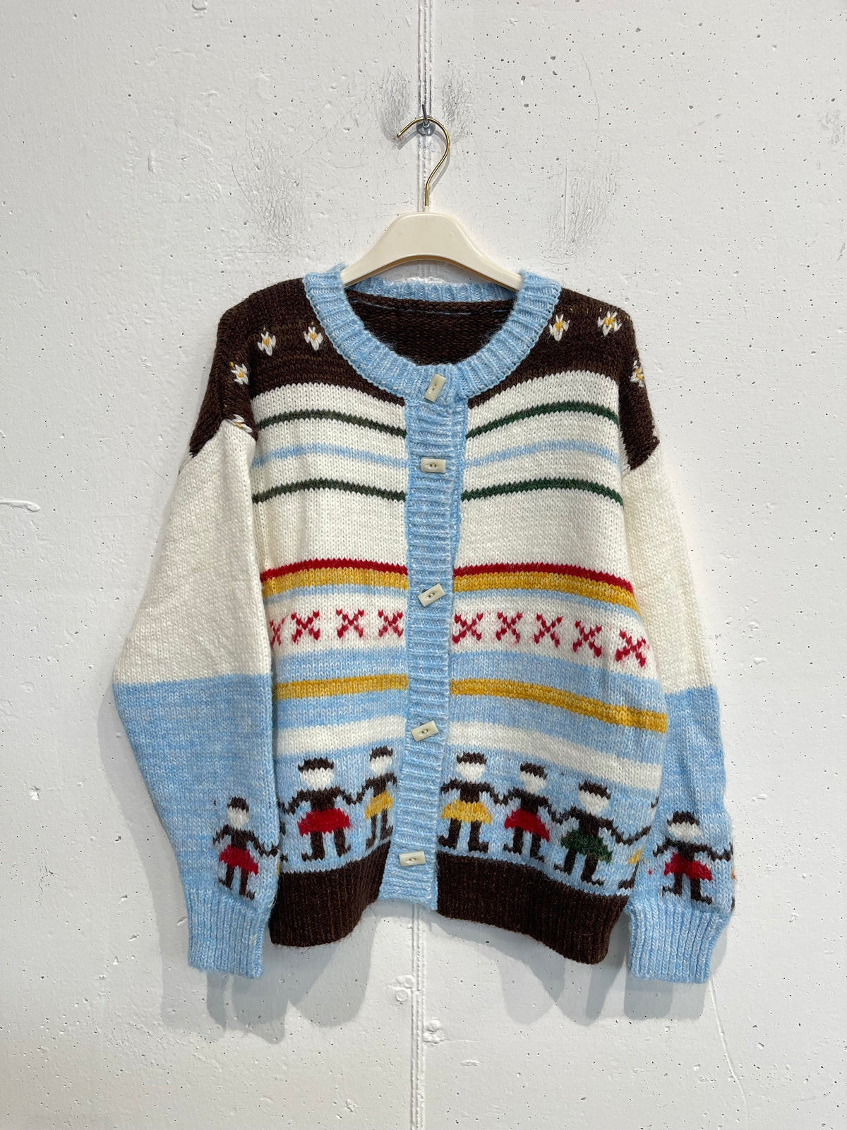 Cardigan con fantasia e bottoni rettangolari