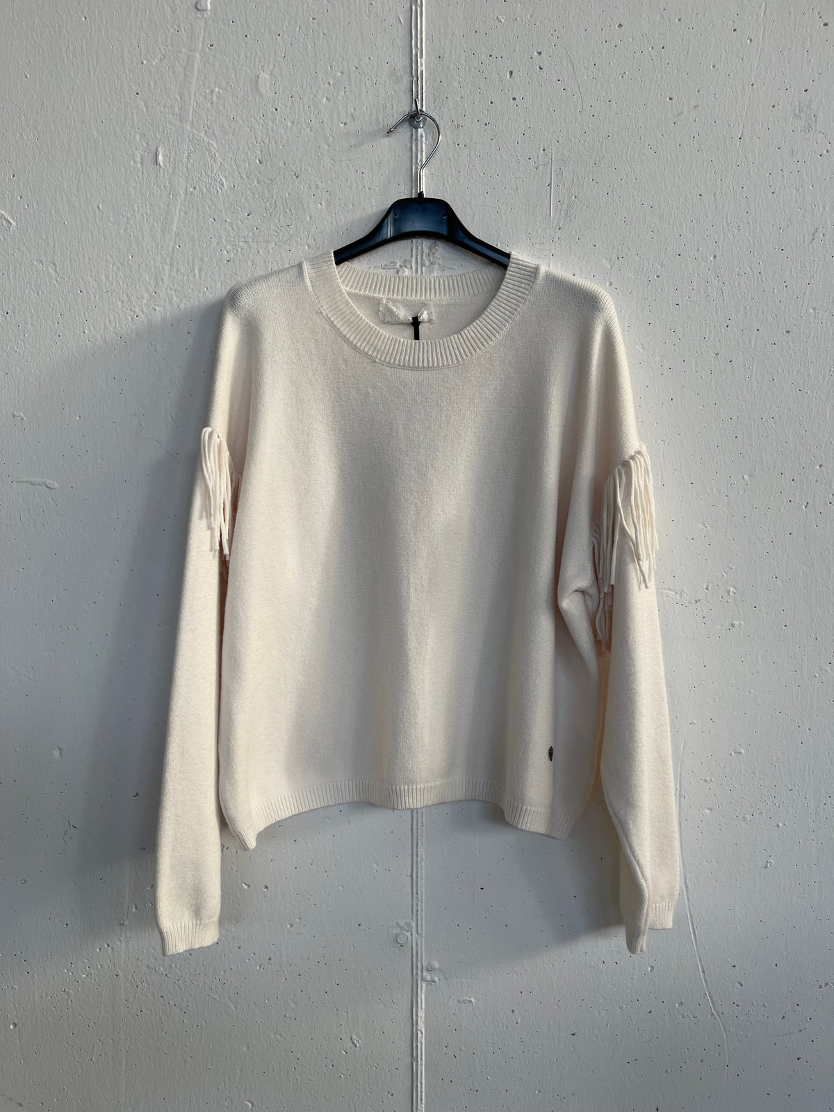 Pull con frange