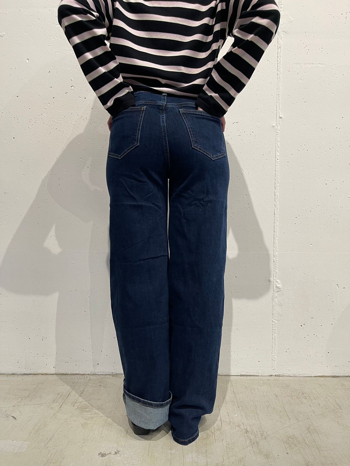 Jeans con bottoni d'orati