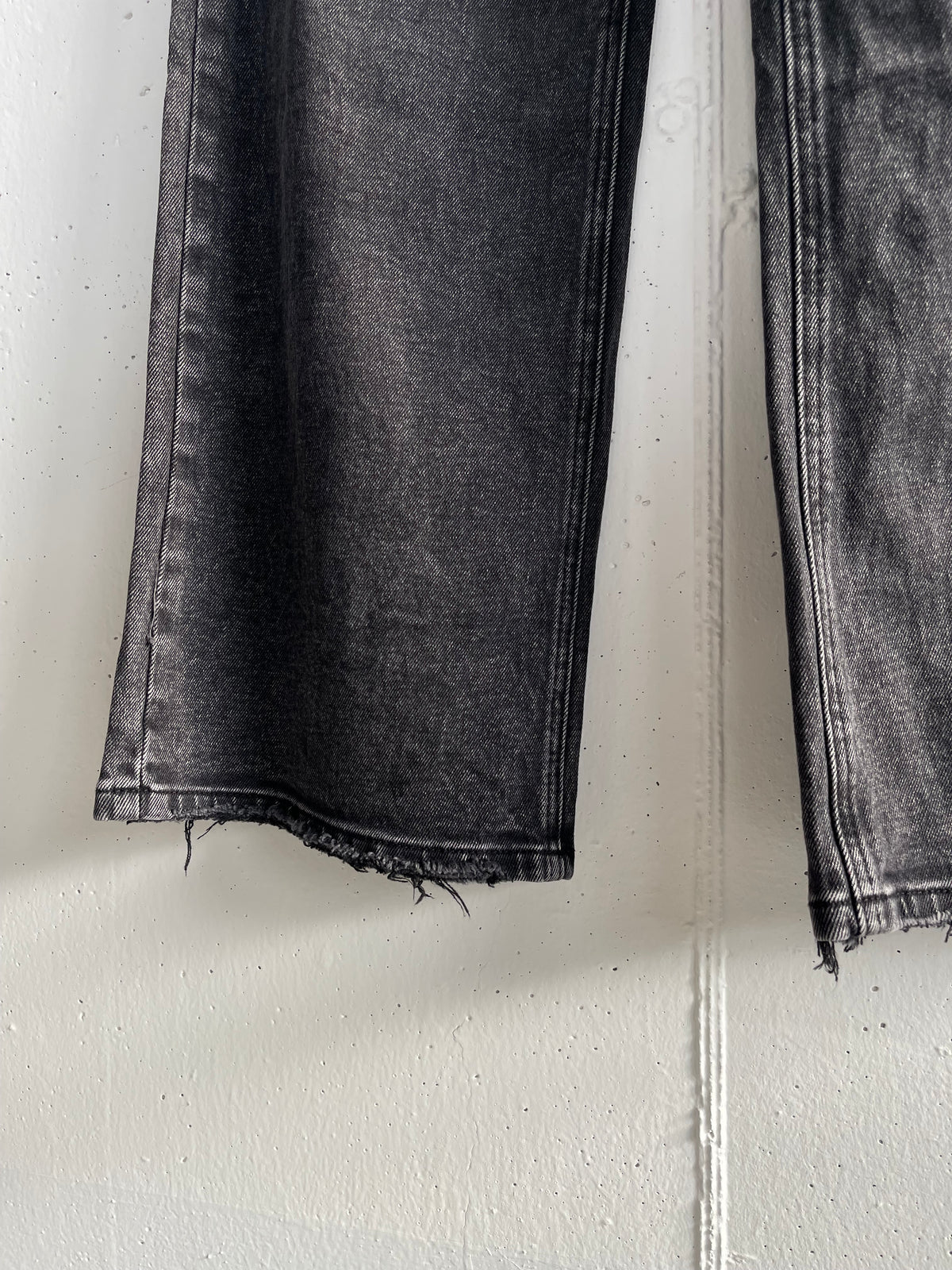 Jeans nero sfrangiato