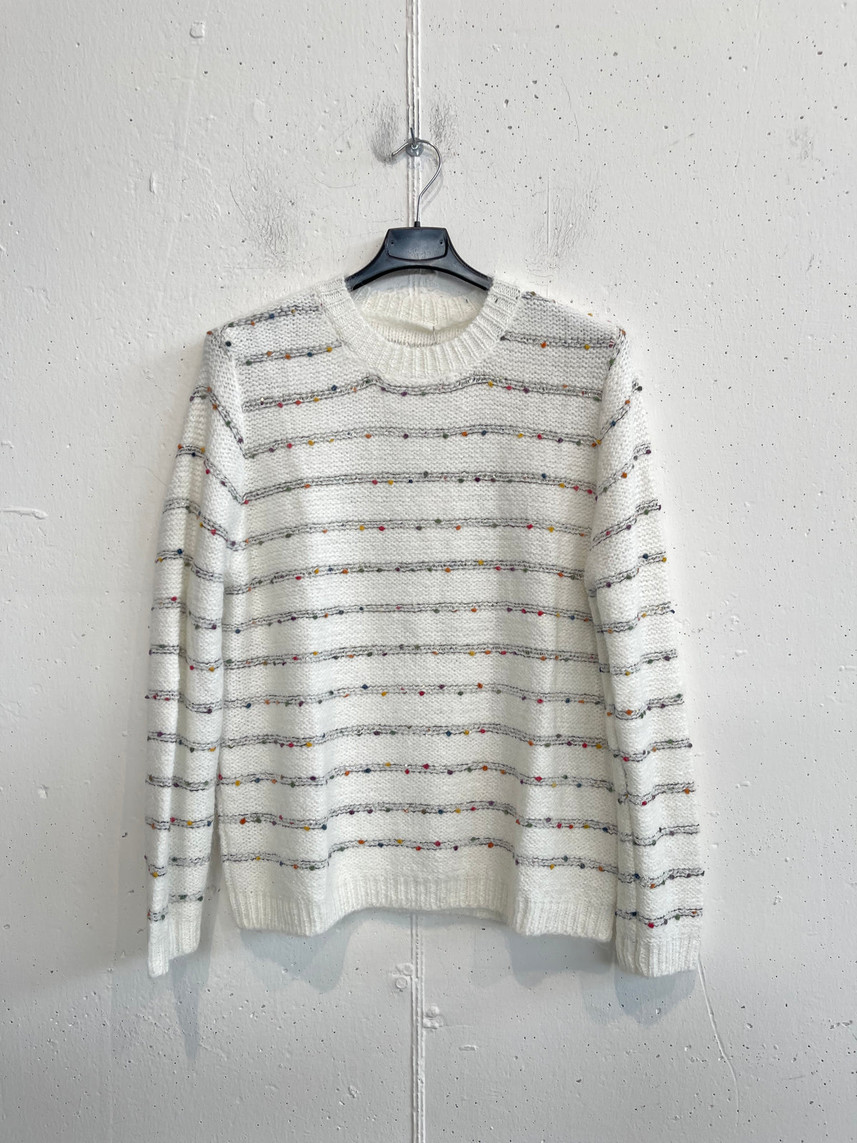 Pull con piccole palline colorate