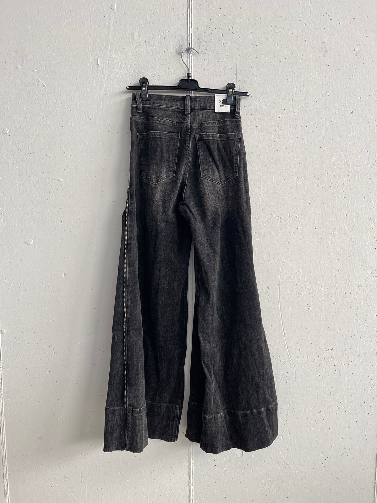 Jeans con zip