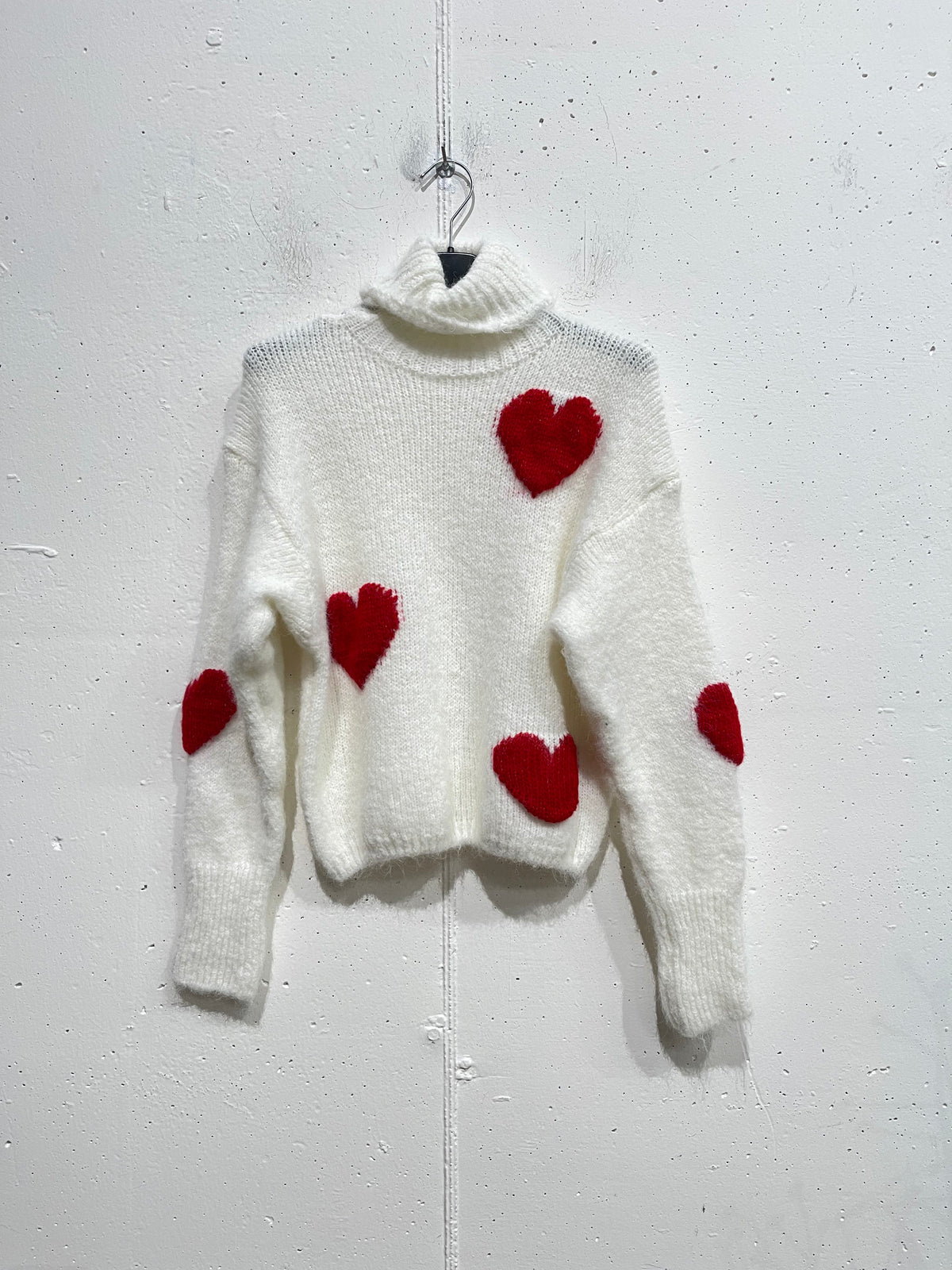 Pull collo alto cuoricioni