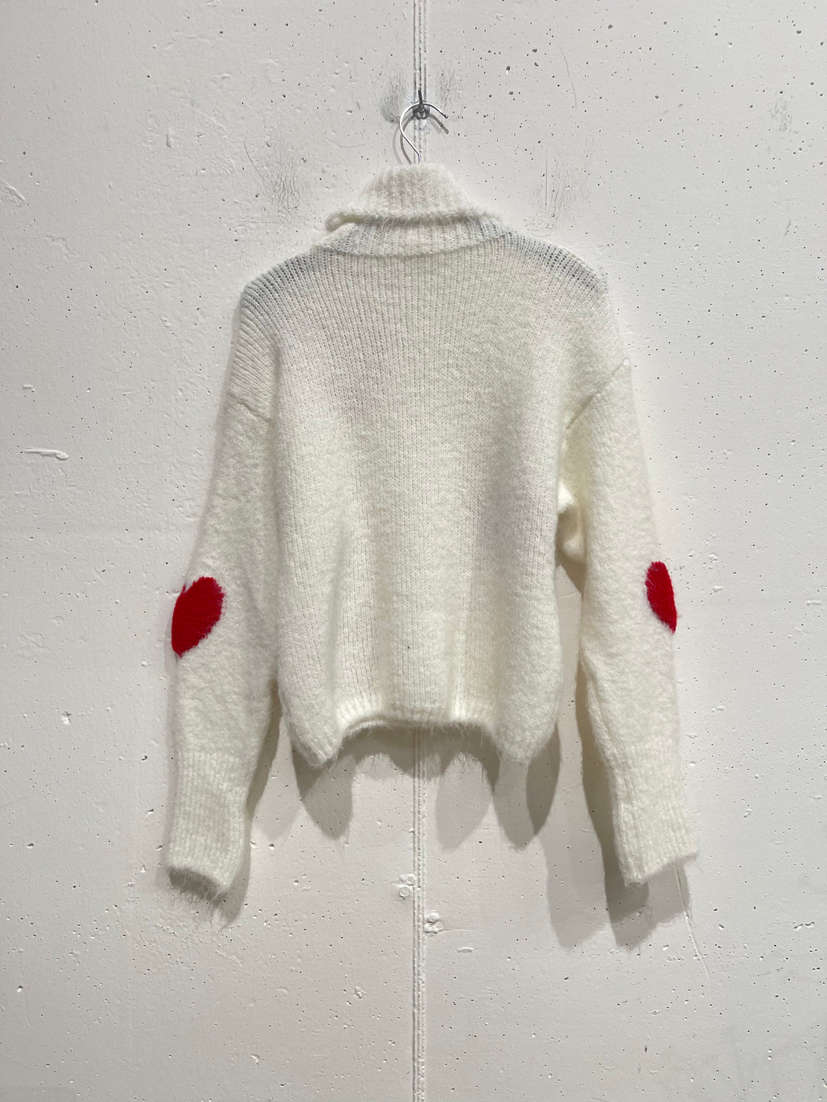 Pull collo alto cuoricioni