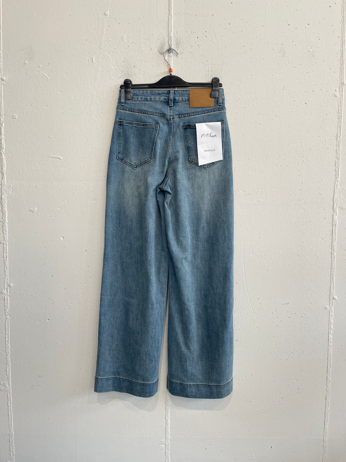Jeans con risvolto cucito