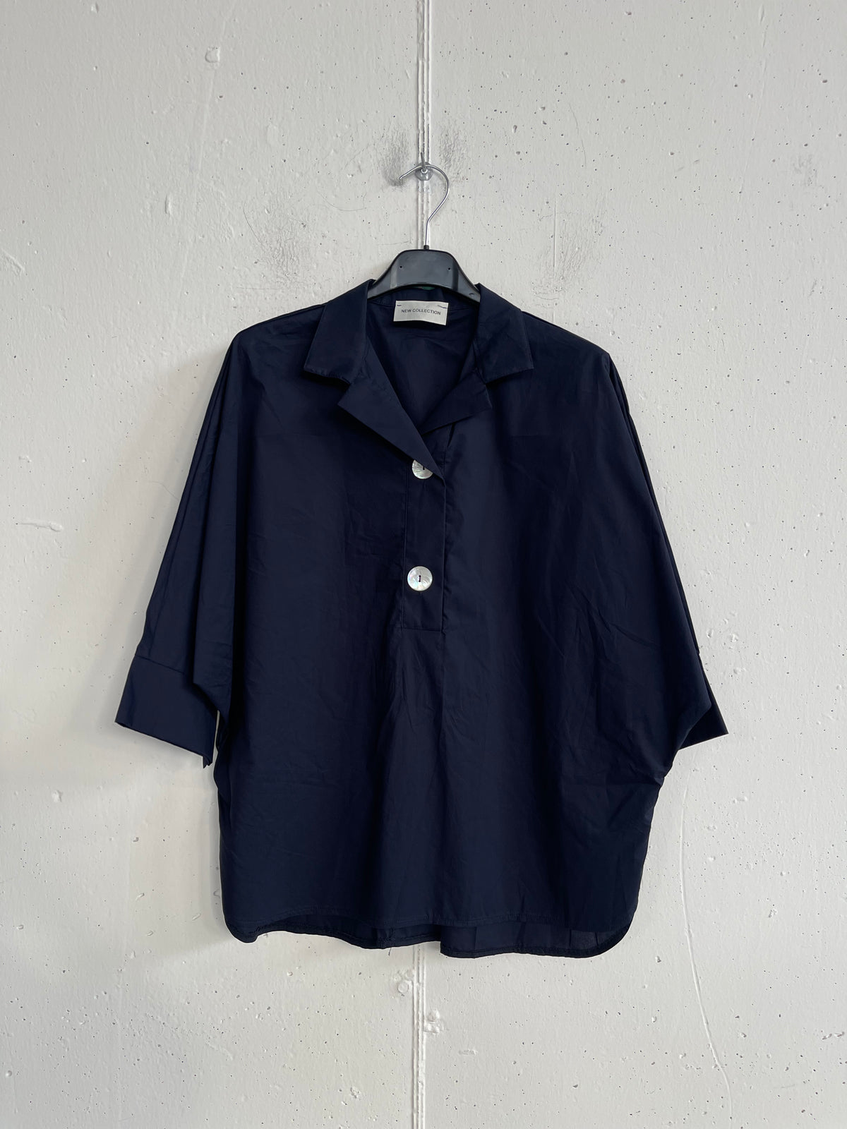 Camicia over con bottone