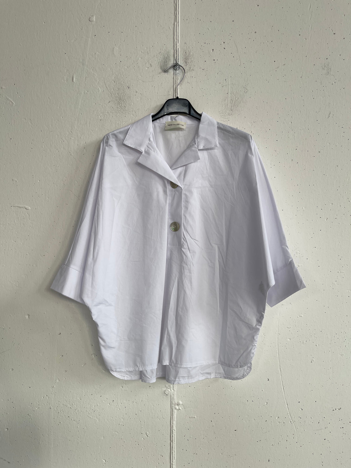 Camicia over con bottone