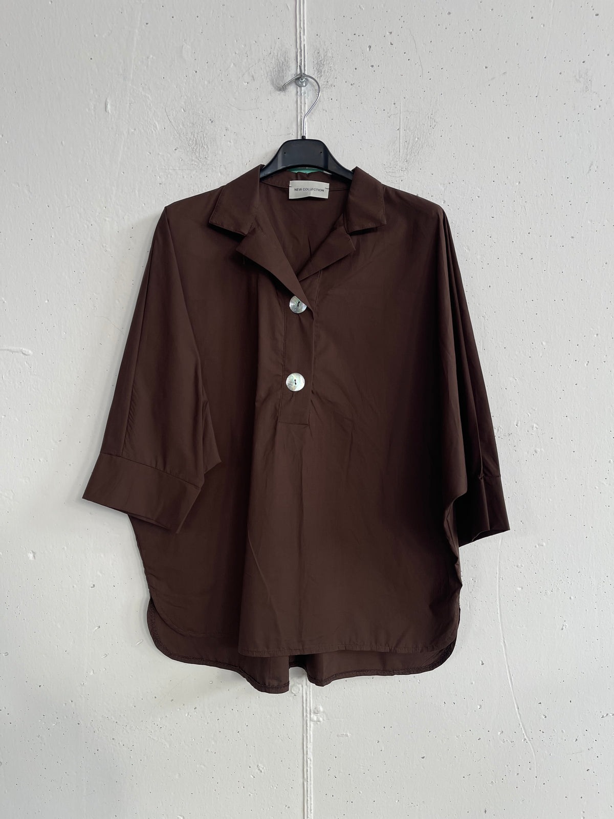 Camicia over con bottone